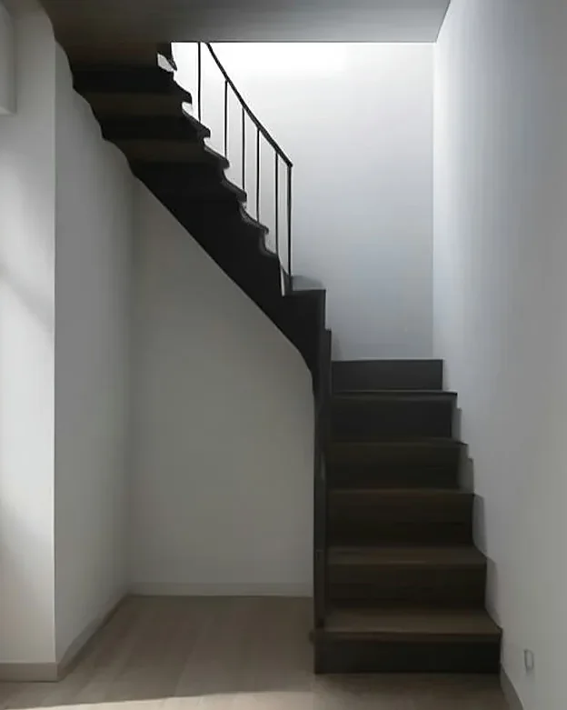 Chevy Chase Canyon Residence: Blackened steel stair under the skylight